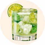 Cóctel fresco con lima servido en el restaurante Ca Na Marcè, frente al puerto de Alcudia, Mallorca